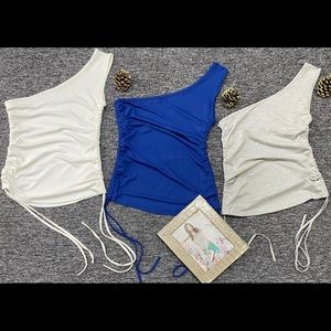 One shoulder blue top